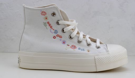 The Converse Chuck Taylor All Star High white sneaker isolated on white background