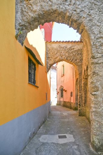 A vertical shot of an alleyway in the historic center of Rivello, Italy in the Basilicata region