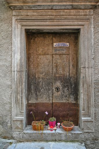 The door of an old church in Rivello, a medieval village in the Basilicata region, Italy.