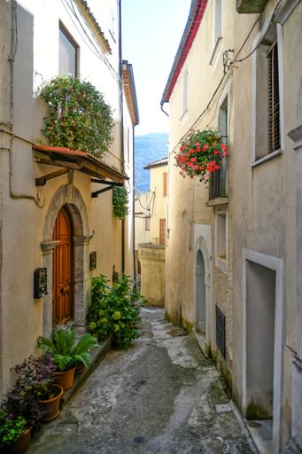 A Vertical shot of a narrow street in the historic center of Rivello, in the Basilicata region, Italy