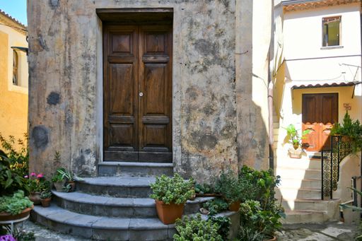 The door of an old church in Rivello, a medieval village in the Basilicata region, Italy.