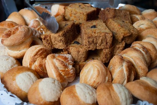 Containers full of bread and sweet cakes for breakfast, handmade baking, source of calories and fiber.