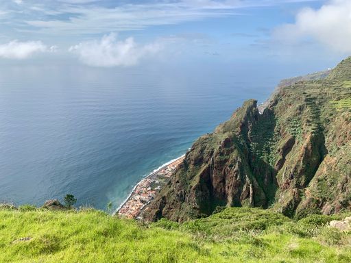 An Aerial shot of Point of Saint Lawrence (Ponta de Sao Lourenco) cliff under a gray cloudy sky