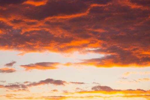 A beautiful low angle shot of the sky at the sunset with colorful clouds