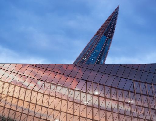 Sunset in reflection on the wall of a building