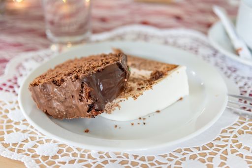 A closeup shot of a chocolate cheesecake on a plate