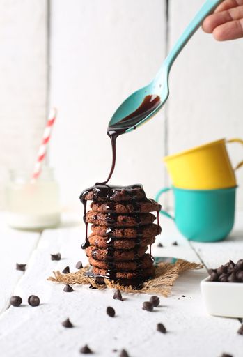 a vertical shot of cookies with melt chocolate