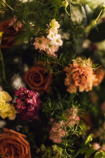 A vertical closeup shot of a bouquet of blooming flowers