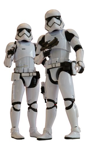 portrait of storm trooper replica, with blaster. He is a fictional character of Star Wars saga.