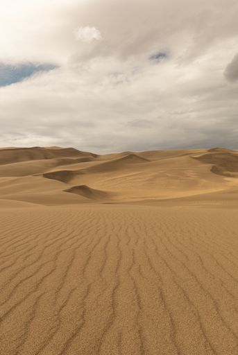 Beautiful Colorado Great Sand dunes at a bright sunset evening