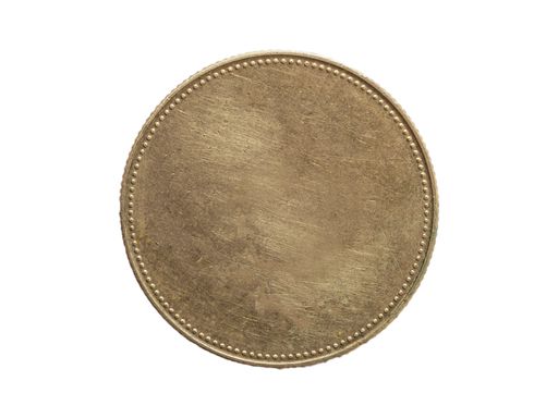 A closeup of a blank metal coin on a plain white background for individual design or montage