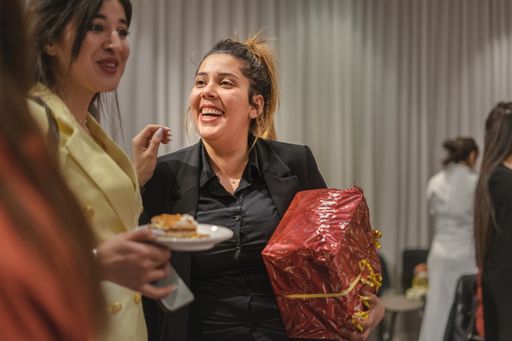 Group of women celebrating Women's day together indoors