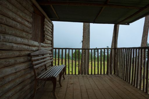 Log cabin in mountains of Sierra de las Minas, Guatemala, rustic architecture with relaxing view