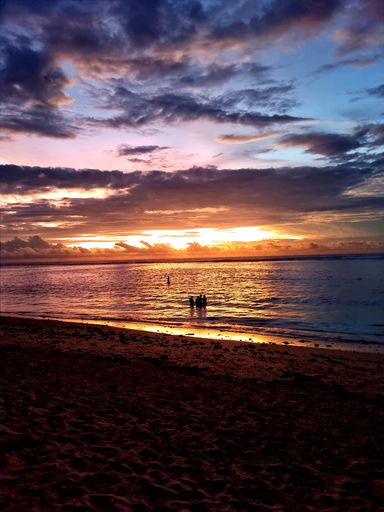 A vertical shot of a beautiful sea during the sunset