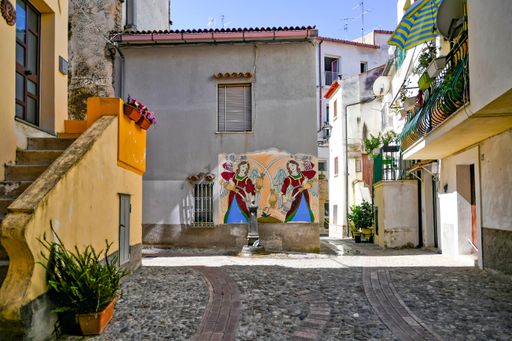 A narrow street in Diamante, a village in Calabria, Italy.