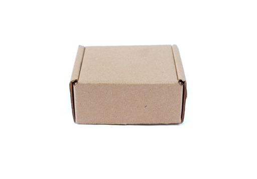 A closeup of a cardboard box isolated on white background