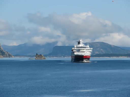 a view of the Hurtigruten mail ship on the beautiful fjords around Norway