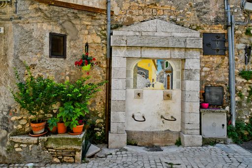 A fountain in a square in Carpineto Romano, an Italian village near Rome, Italy