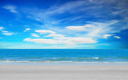 A beautiful view of a sea under a stunning cloudy sky