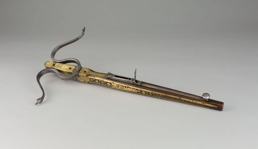 A closeup shot of a Pellet Crossbow, arms and armor on white background