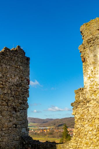 A beautiful view of Brandenburg castle ruins in the Werra valley in Germany with blue sunny sky