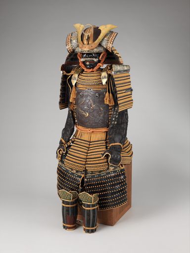 A vertical shot of samurai armor isolated on gray background