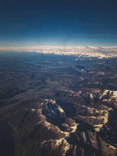 A beautiful view of snowy mountains in a daylight