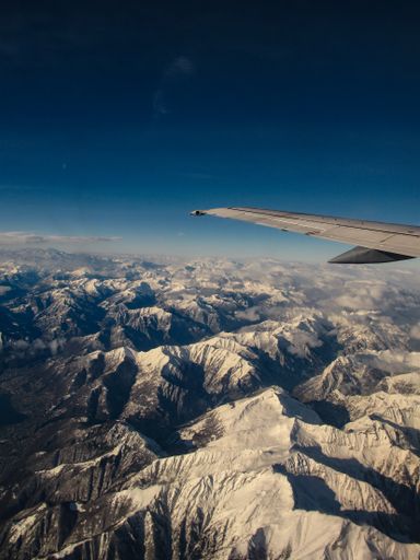 A beautiful view of snowy mountains in a daylight