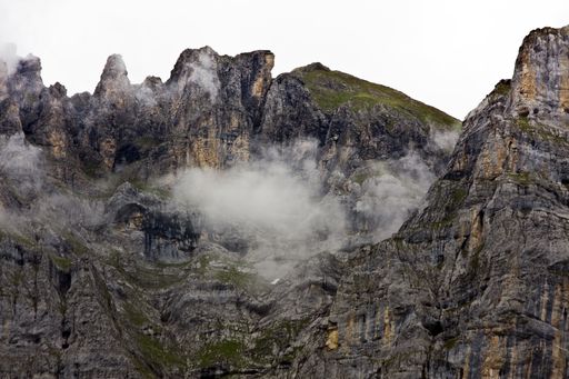 A mesmerizing shot of the beautiful rocky mountains under a cloudy sky