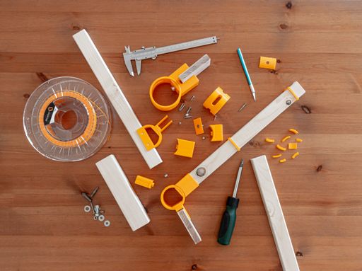 A top shot of tools for repairing on the wooden table