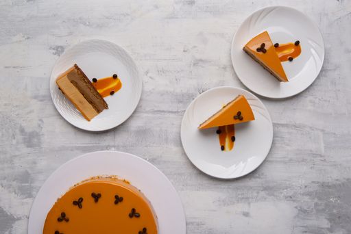 A top view of slices of tasty cake on white plates