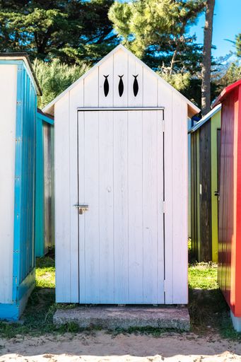 Wooden beach cabins on the Oleron island in France, colorful huts