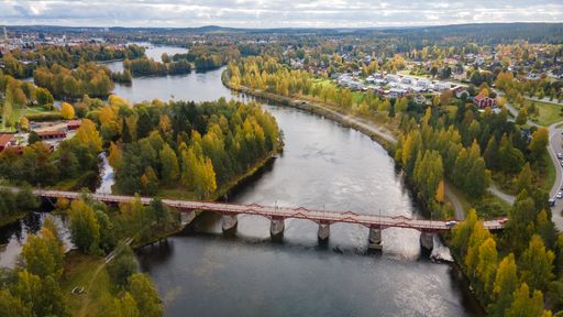 An aerial view of the Lejonstromsbron wooden bridge in Skelleftea, Sweden, crossing the Skellefte River