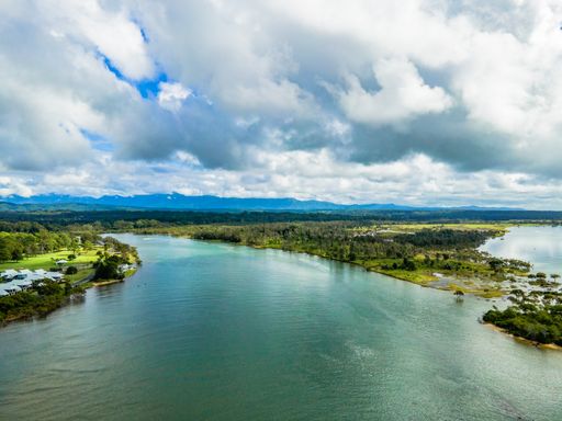An aerial scenic view of the seaside Urunga town, NSW, Australia