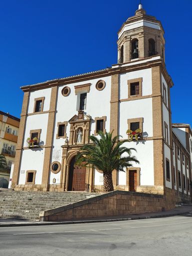 A vertical shot of the Church of Our Lady of Mercy on a sunny day in Ronda, Spain