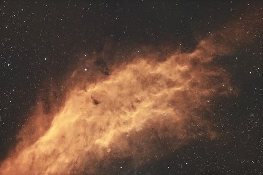 An end of the California Nebula (NGC1499) showing tendrils of Hydrogen-alpha (Ha) fading to the black of space.