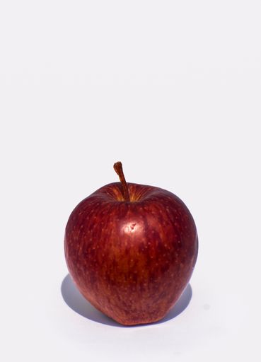 An apple over white background