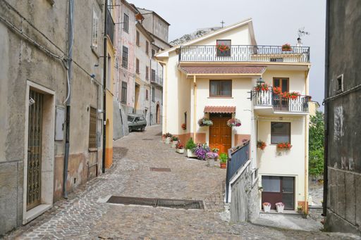 A narrow street among the old houses of Pietrabbondante in a medieval village in the Molise region