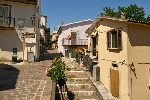 A narrow street among the old houses of Ruvo del Monte in a medieval village in the Basilicata region