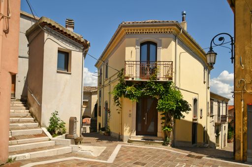 A narrow street among the old houses of Ruvo del Monte in a medieval village in the Basilicata region