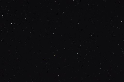 The background of the night stellar sky with many stars