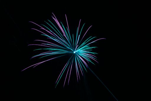 A colorful firework on a black isolated background