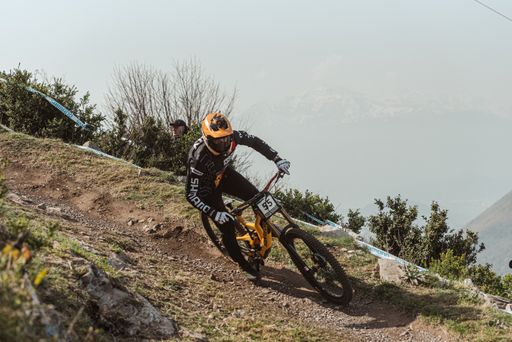A cyclist Laly Thibault competing during the UCI mountain bike downhill world cup 2022 , Lourdes