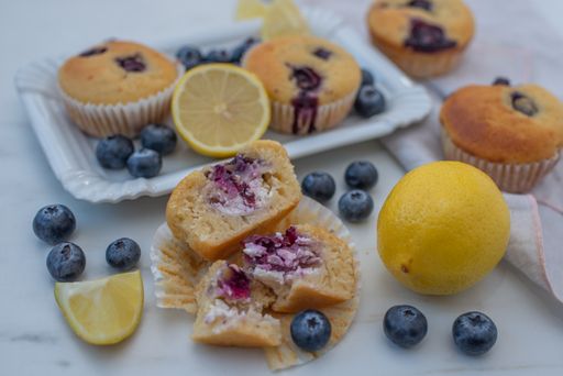 A closeup shot of blueberry ricotta muffins with lemon