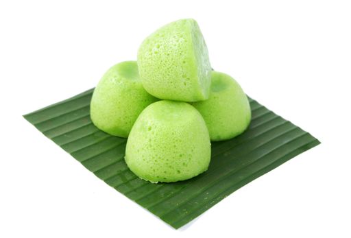 A photo of Apam Kampung Perisa Pandan, a Malaysian dessert, isolated on a white background
