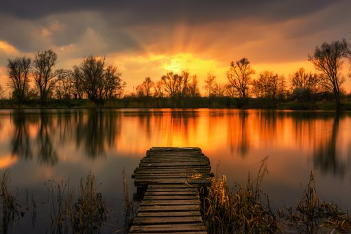 A wonderful view of the sunset from a jetty on the lake