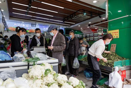 A group of people in a supermarket shopping for essentials in preparation for the lockdown during the COVID19 pandemic