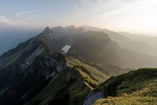 A panoramic view of green mountains in Switzerland