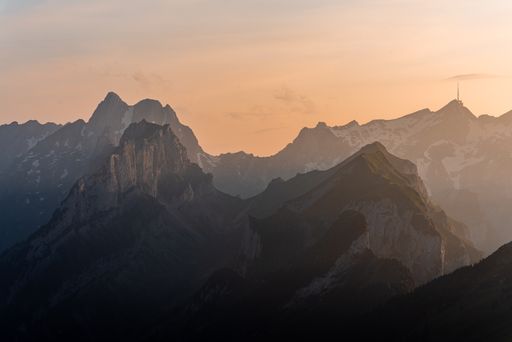 A view of evening light over the Alpstein mountains, photographed from Hoher Kasten.