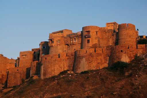 A low angle shot of The castle in Jaisalmer, India under the clear blue sky